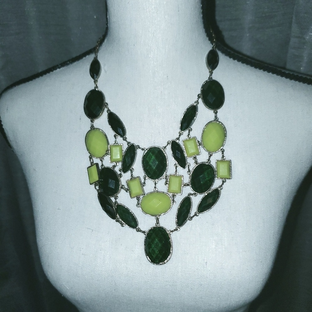 Gold tone with Hunter and lime green jewels